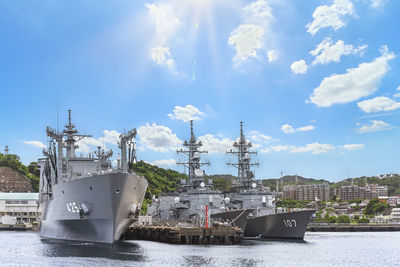 Replenishment oiler js masyu and destroyer ships js murasame and js ikazuchi in yokosuka naval port.