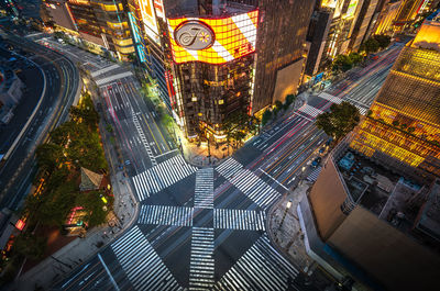 High angle view of illuminated buildings in city at night