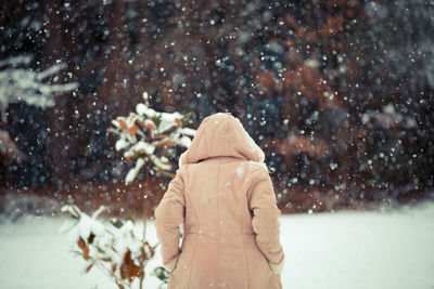 Rear view of man on snow