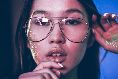 Close-up portrait of a young woman