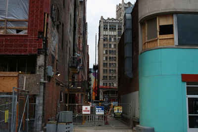 Buildings in city against sky