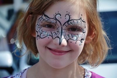 Close-up portrait of smiling girl