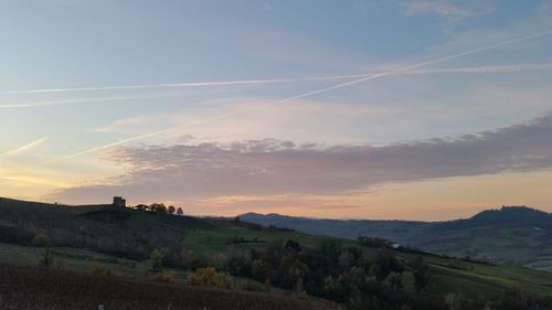 Landscape with mountain range in background