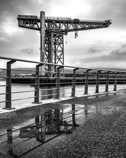 Pier over sea against sky