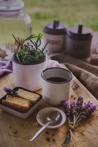 Food and drink with flowers on table