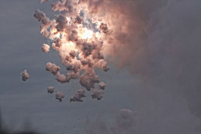 Low angle view of firework explosion in sky