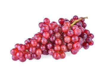 Close-up of grapes against white background