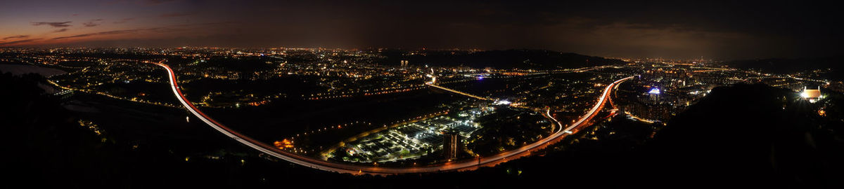 High angle view of illuminated city at night