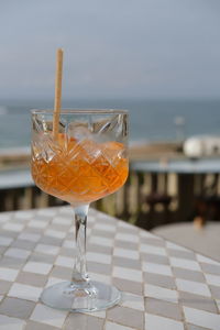 Aperol spritz at a beachfront bar