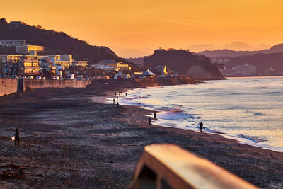 Scenic view of sea against sky during sunrise