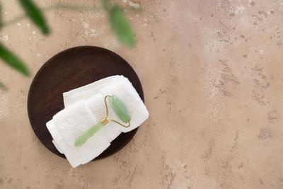 High angle view of hat on sand