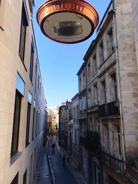 Low angle view of buildings against sky in city