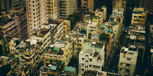 High angle view of dense residential buildings in city