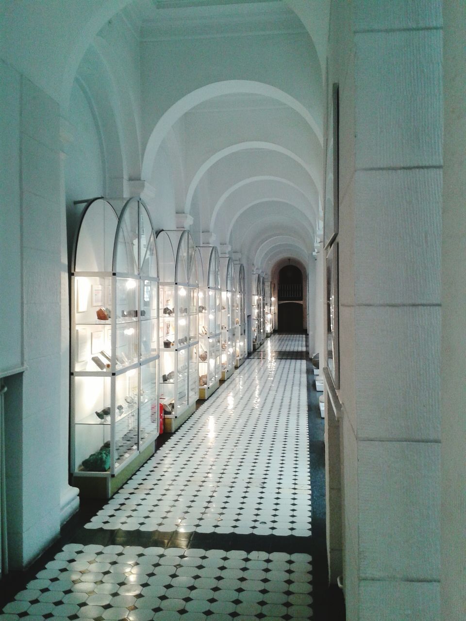 indoors, architecture, arch, built structure, corridor, ceiling, interior, church, empty, window, the way forward, place of worship, door, building, religion, day, diminishing perspective, in a row, flooring