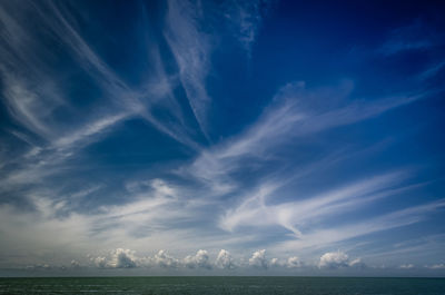 Scenic view of sea against blue sky