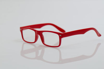 High angle view of eyeglasses on white background
