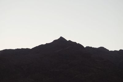 Low angle view of mountain against clear sky