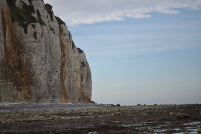 Rock formations on landscape against sky