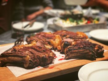 Close-up of meat on barbecue grill