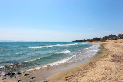 Scenic view of beach against sky