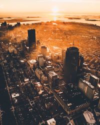 Aerial view of city during sunset