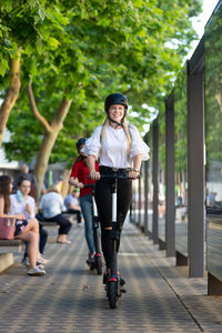 Full length portrait of a young couple outdoors