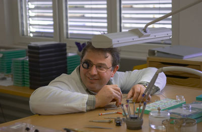 Smiling scientist in laboratory