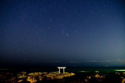 Scenic view of star field against sky at night