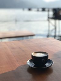 Coffee cup on table