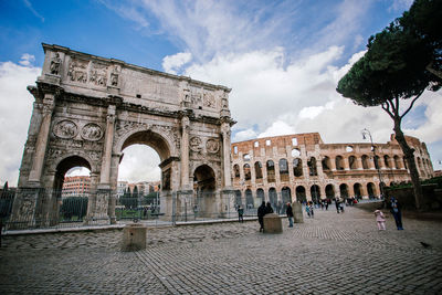 Group of people in front of historical building