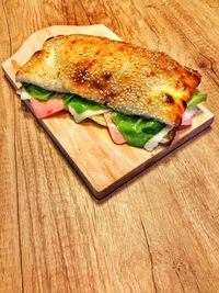 Close-up of meal served on cutting board