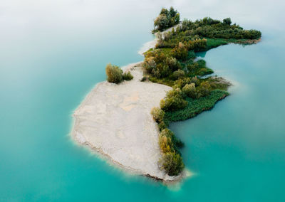 High angle view of island amidst sea