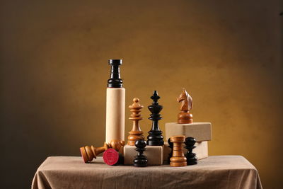 Close-up of chess pieces on table
