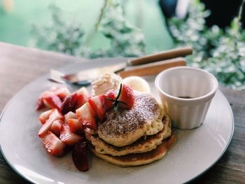 Close-up of breakfast served on table