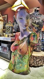 Statue of woman in store