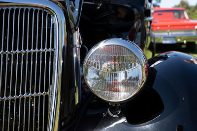 Close up of vintage car head light