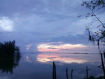 Scenic view of silhouette trees against sky