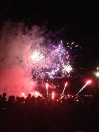 Firework display at night