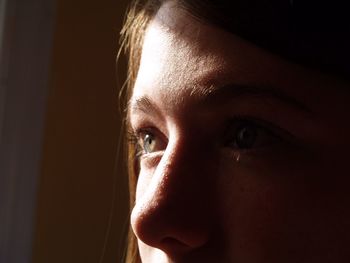 Close-up portrait of a serious young woman