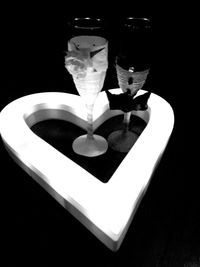 High angle view of drink on table against black background