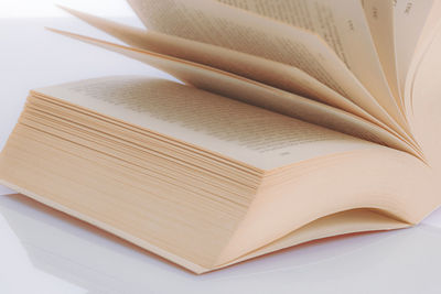 High angle view of open book on table