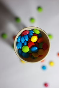 High angle view of multi colored balls on table