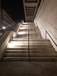 Low angle view of illuminated staircase in building