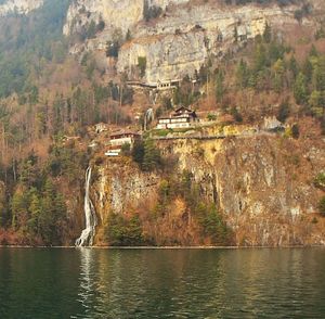 Scenic view of lake with mountains in background