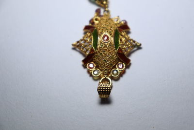 High angle view of decoration on table against white background