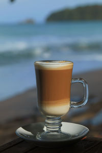 Close-up of coffee cup on table