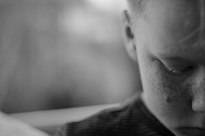 Cropped image of boy with freckle on face