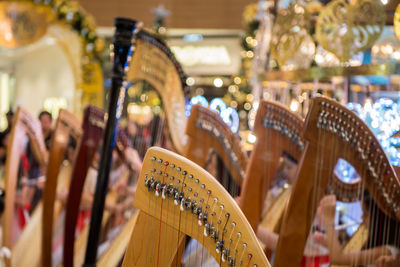 Close-up of harps for sale