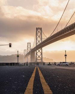 View of bridge against cloudy sky