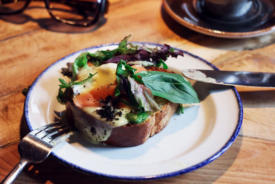 High angle view of breakfast in plate on table